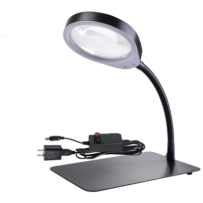 Lampe med forstørrelsesglas